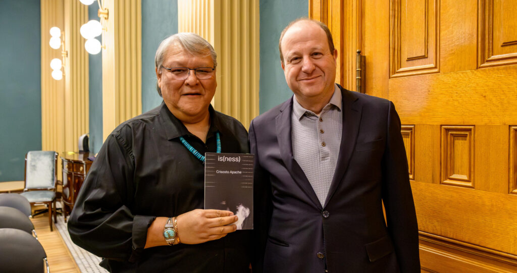 Colorado's 11th Poet Laureate, Crisosto Apache (left) with Colorado's 43rd Governor, Jared Polis (right).